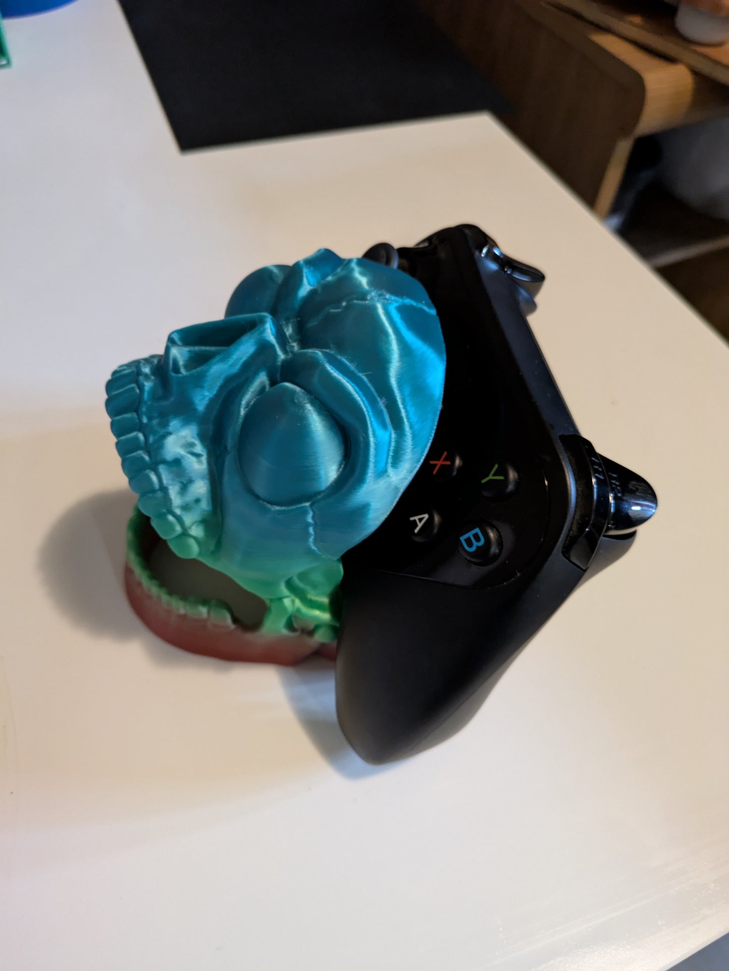 Screaming skull game controller holder