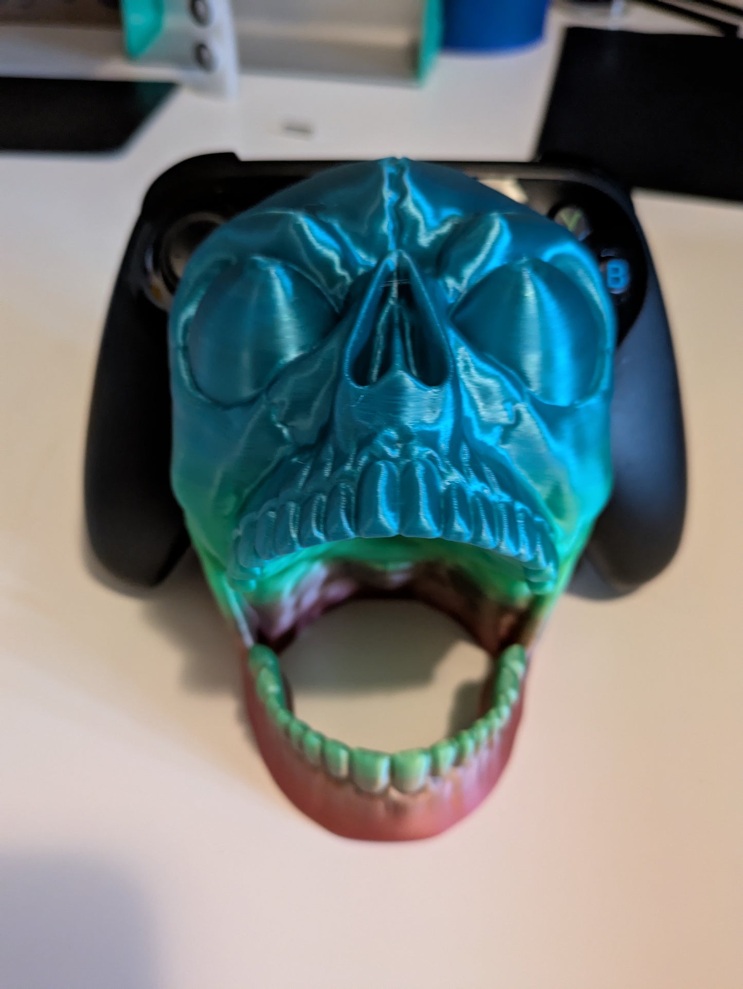 Screaming skull game controller holder